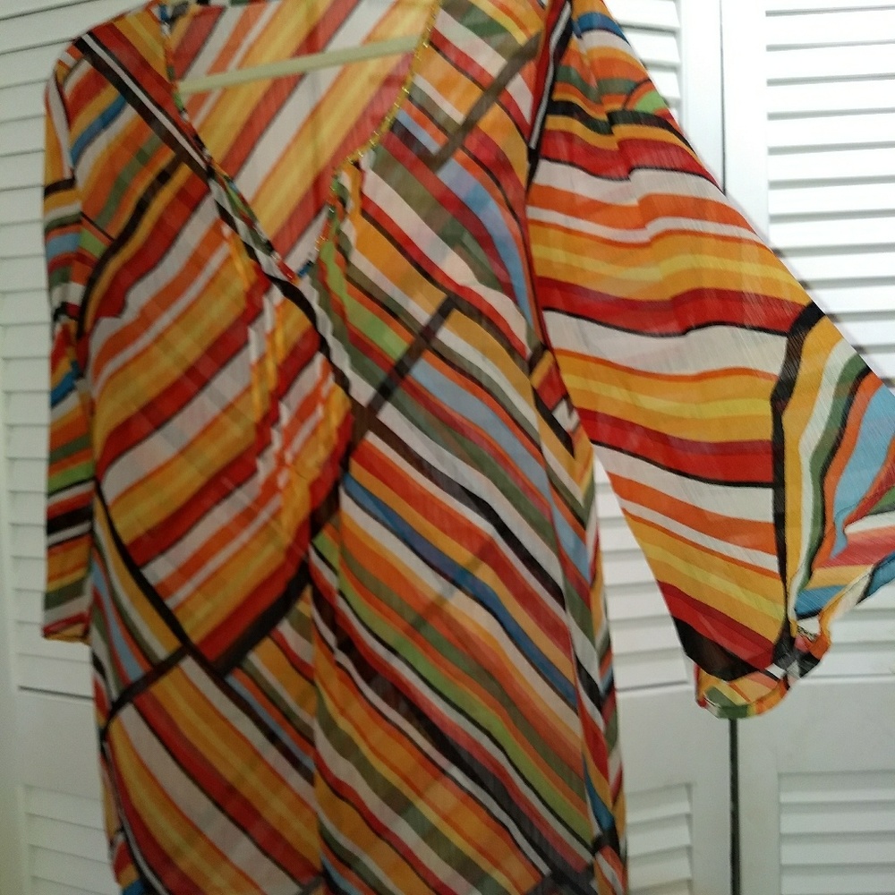 Sheer, flowy BoHo top with bright vivid colors